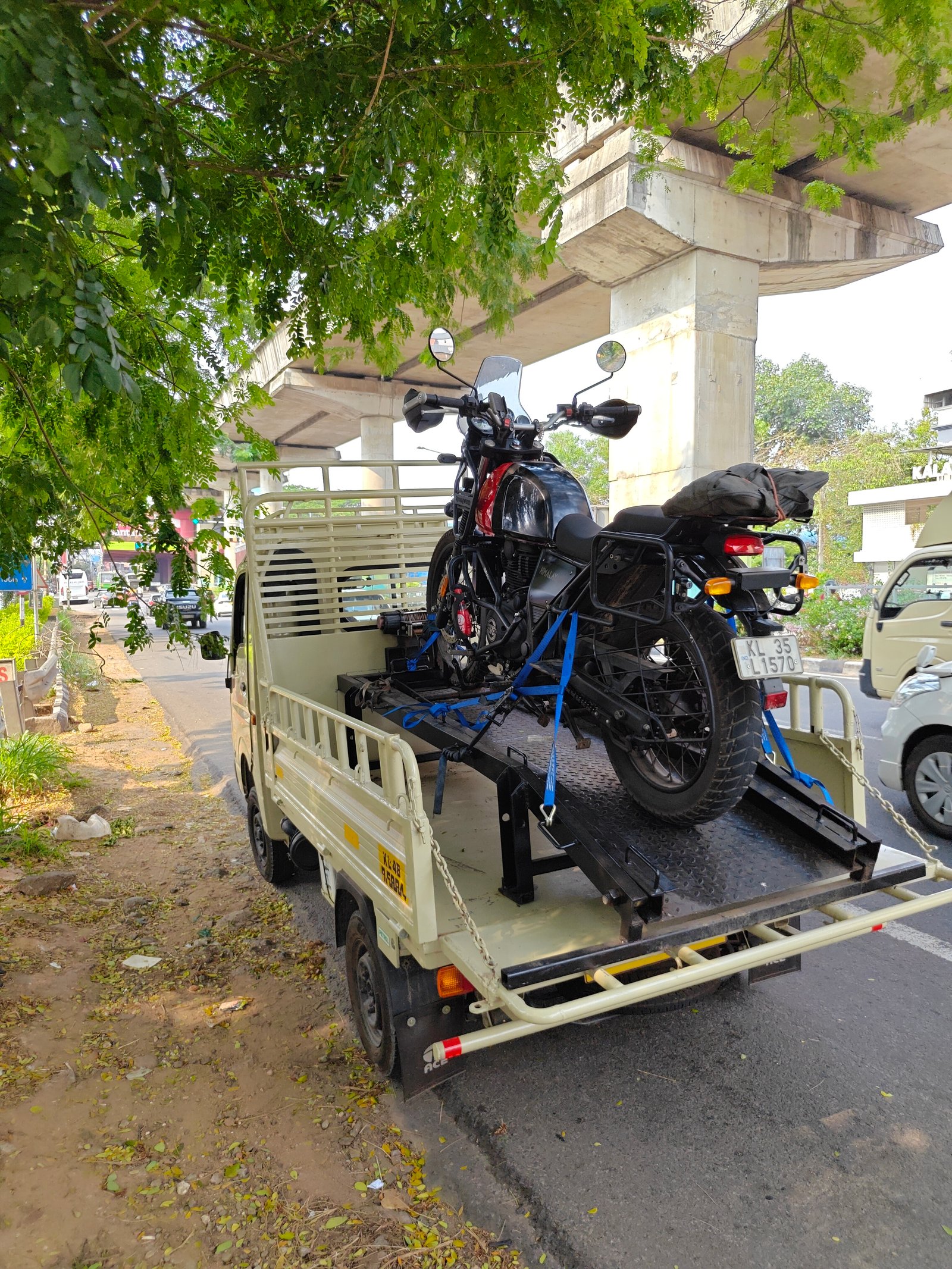 Flatbed Towing in Kochi - GadiGuard Recovery Van Towing a Royal Enfield Bike