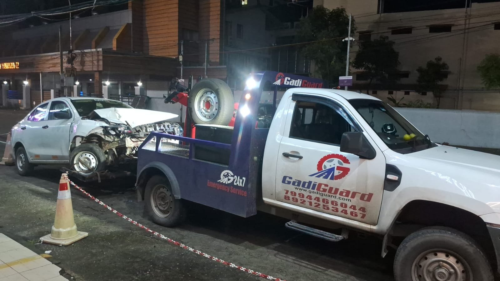 Recovery Van in Ernakulam towing a car - Towing Service in Ernakulam